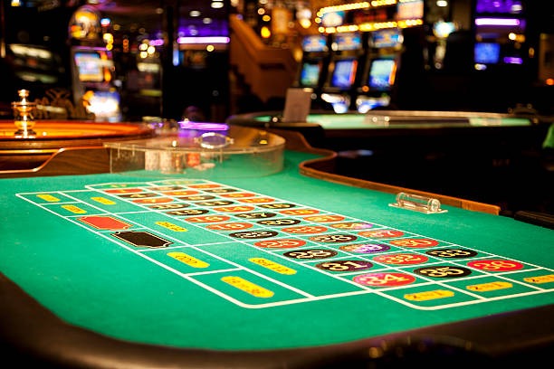 Live dealer at Asia Gaming studio showing multiple camera angles and interactive table interface